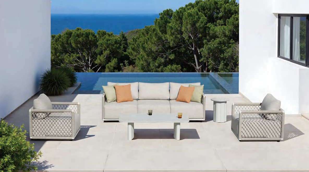 Modern teak outdoor dining table on an Amsterdam terrace