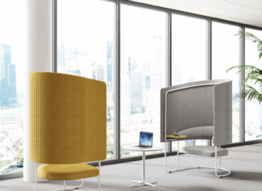Modern office reception area with stylish sofas
