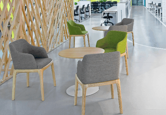Team collaborating at a large office desk