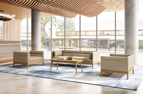 Modern office with employees using ergonomic mesh chairs