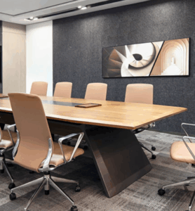 Assortment of colorful acoustic desk divider panels stacked