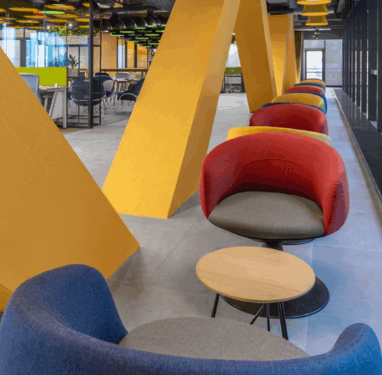 Modern office space with several ergonomic chairs