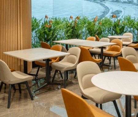 Sustainable cafe style office chairs in a bright setting
