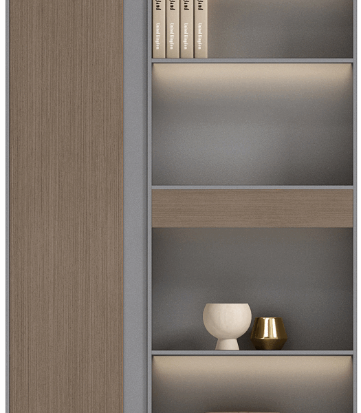 A worker inspecting a stack of flat-pack wooden cabinet components