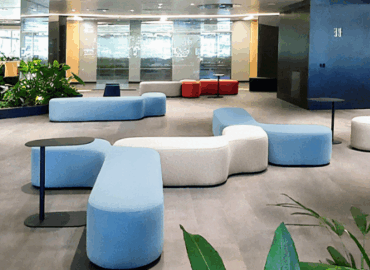 A professional reception desk with well-appointed waiting chairs.