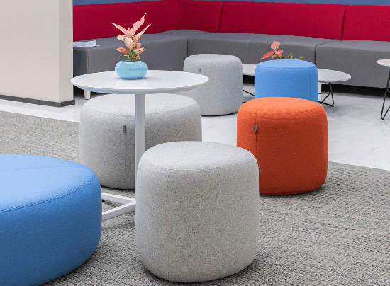 Various shapes of conference tables in an office setting